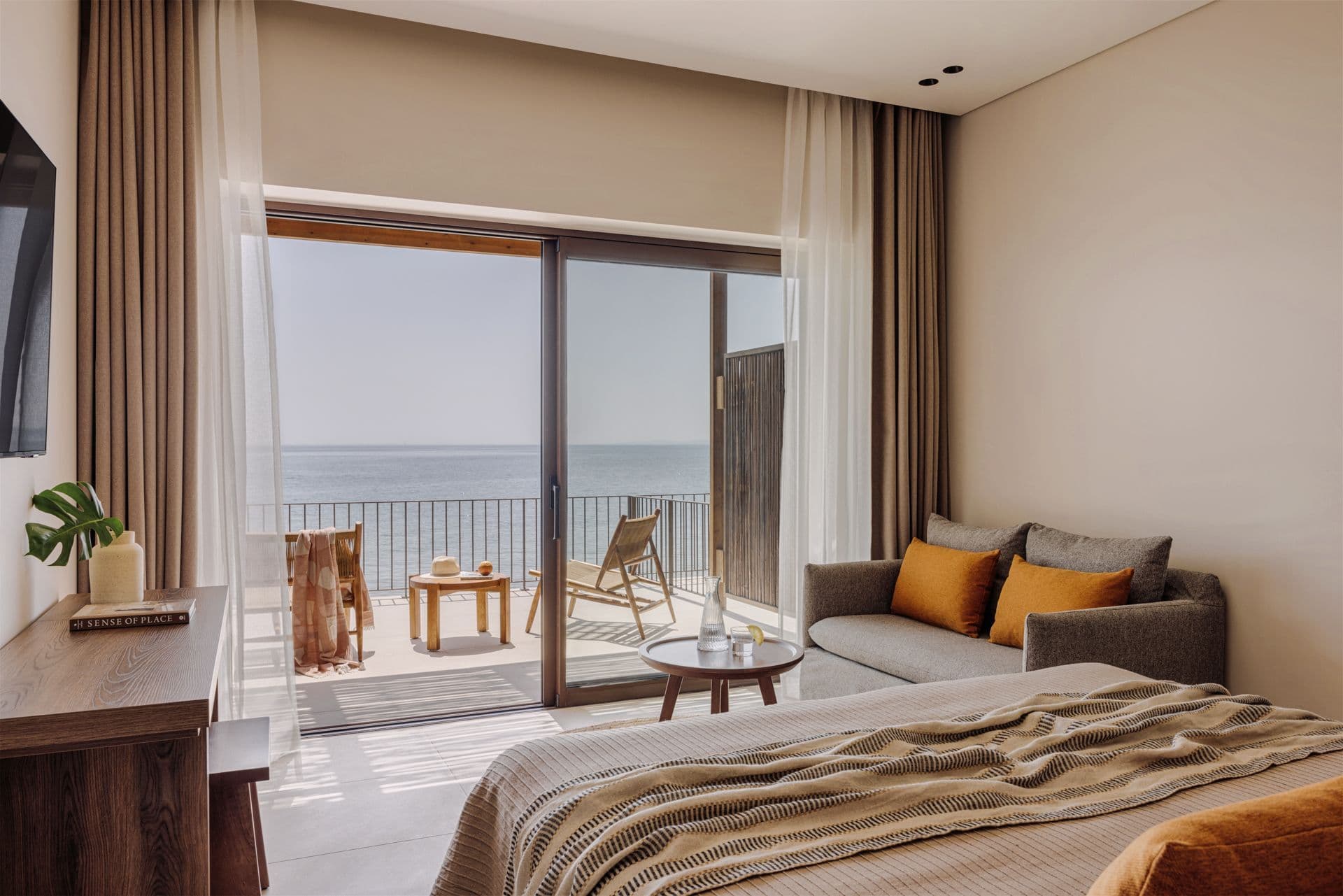 Junior Suite at Cabo Hotel Corfu with private balcony and sweeping Ionian Sea views