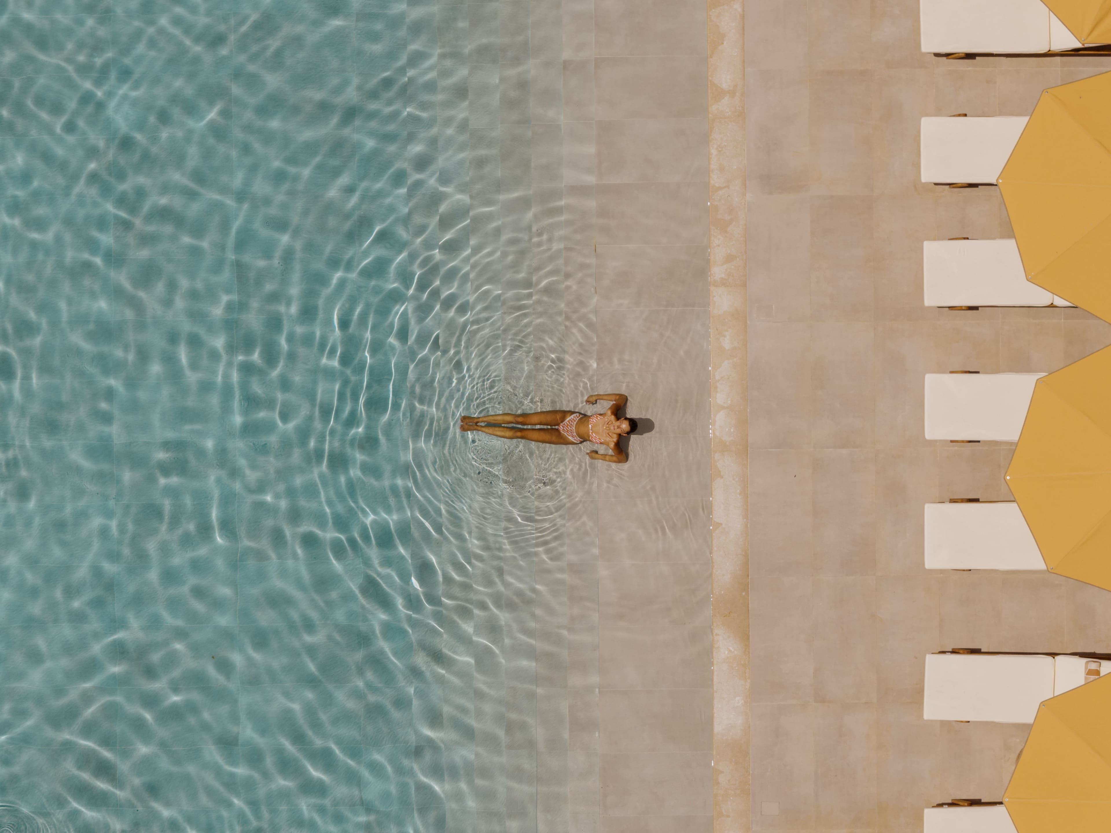 Aerial view of Mayor Cabo Hotel in Corfu with infinity pool and Ionian Sea view