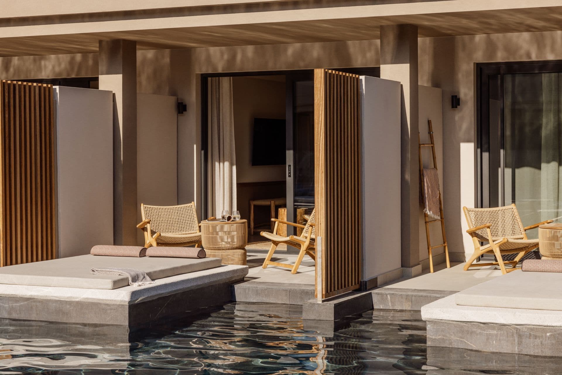 Junior Suite Swim-Up at Unda Hotel in Corfu with private terrace, sun loungers, and direct access to shared pool